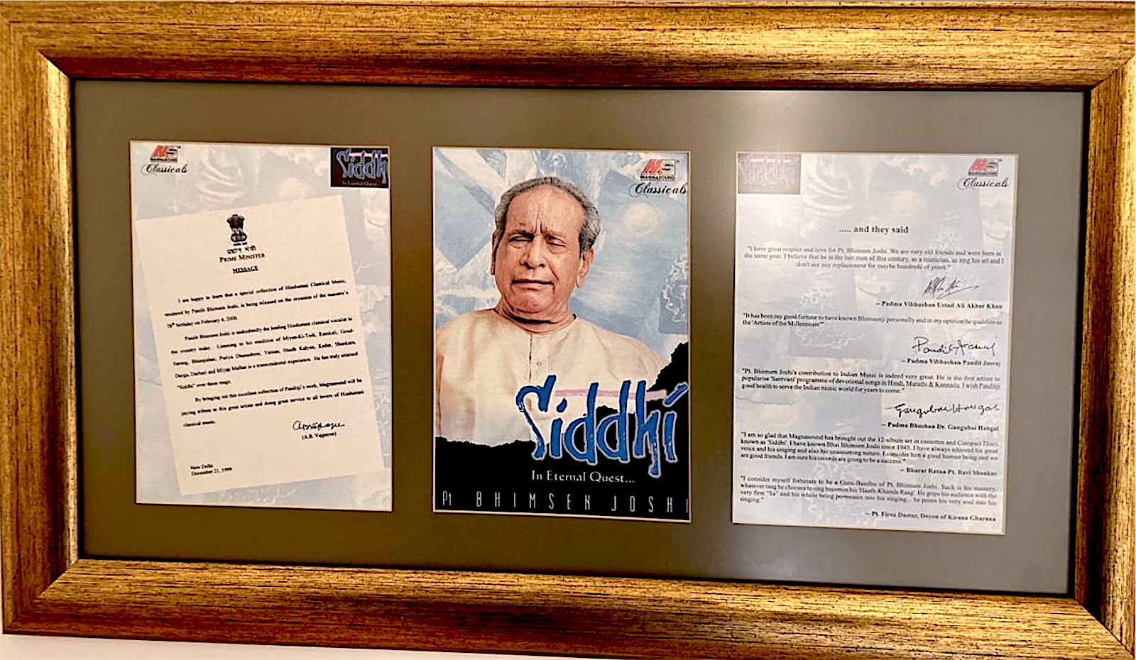 The framed presentation: the Prime Minister's message on the left, the Siddhi cover in the centre, and tributes from Ustad Ali Akbar Khan, Pandit Jasraj, Dr. Gangubai Hangal, Pt. Ravi Shankar and Pt. Firoz Dastur on the right.