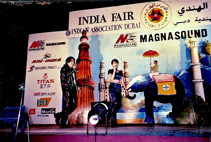The India Fair stage backdrop: Indian Association Dubai, with Magnasound as main sponsor above Air India, Titan and others.