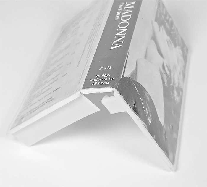 The case standing open on its own hinge, spine showing Rs. 40 inclusive of all taxes